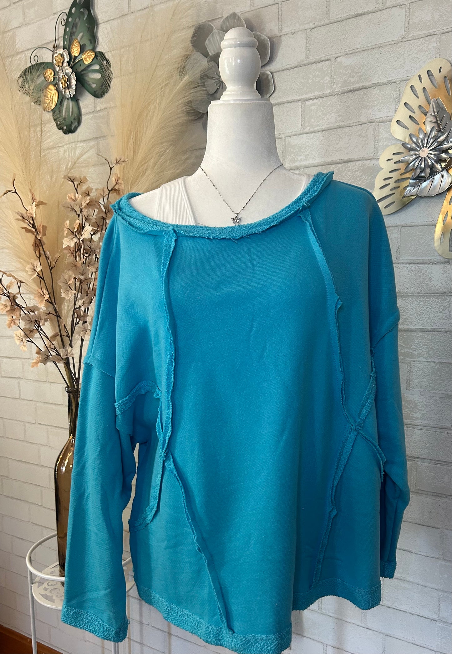 Bucket List-Oversized Solid Raw Edge Detail Long Sleeves
Top